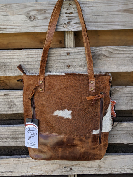 Distressed brown riveted cowhide purse | Shop now at Engayla Clothing  Boutique